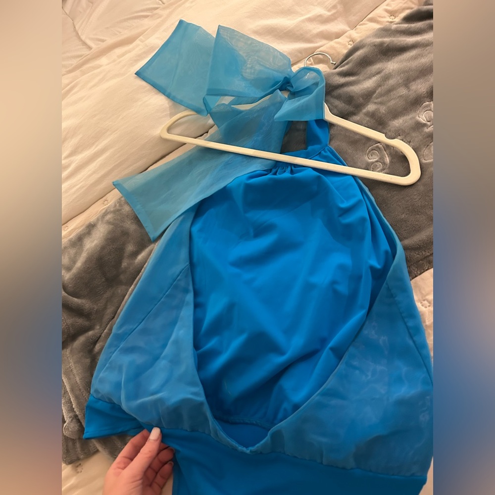 Women’s blue backless body suit